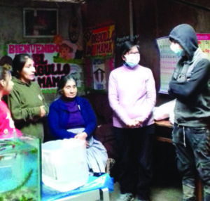 Sisters and volunteers waiting to serve needy childrenserving-needy-children